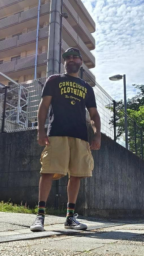 "Conscious Clothing" Tee (Black/Gold) The Drapery